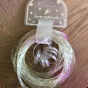 Set of 12 clear silicone rubber bracelets, 6 rings